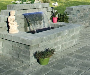 Professionally installed water feature with natural stone